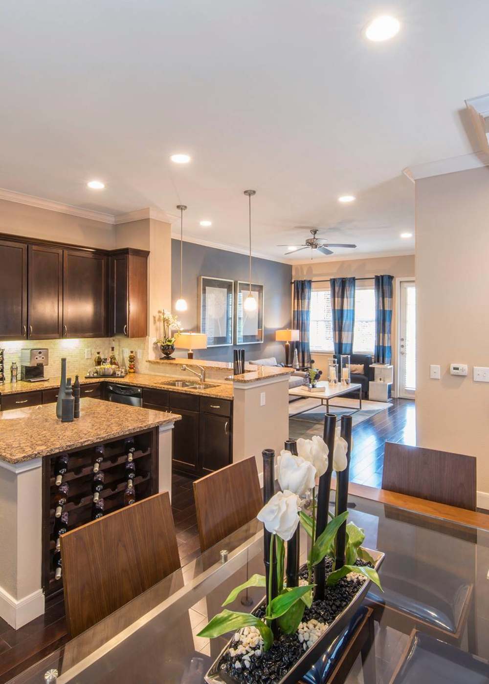 Kitchen with stainless-steel appliances at Perry Row in Dallas, Texas
