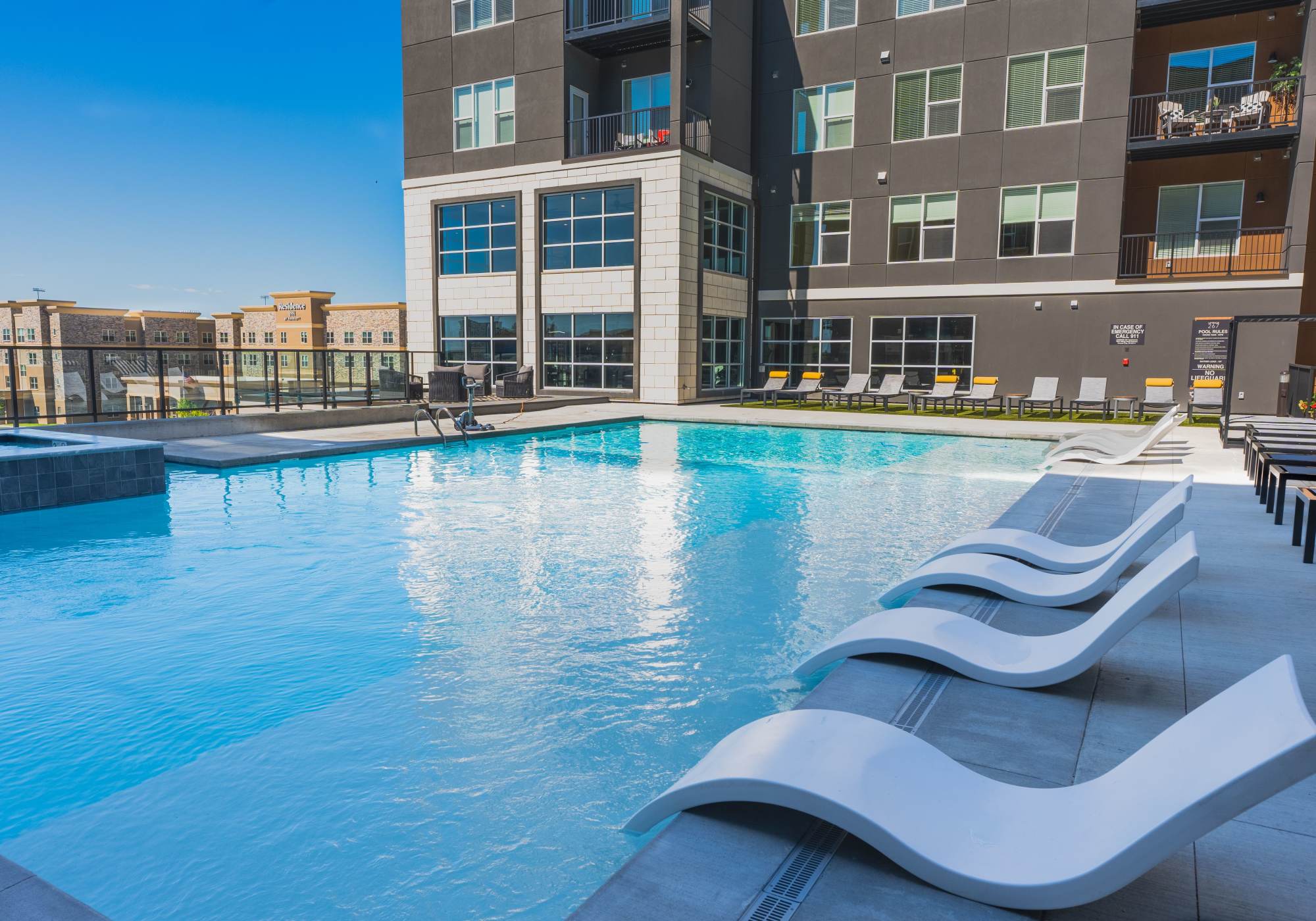 Sparkling water pool at Legends 267 Apartments in Kansas City, Kansas