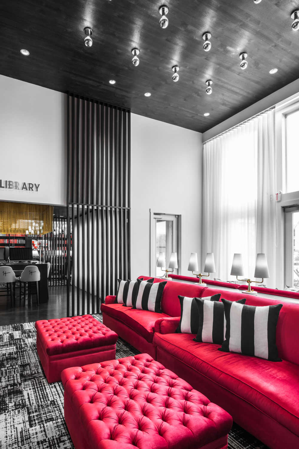 Clubhouse lounge with art deco furnishings at The Holly in Lubbock, Texas