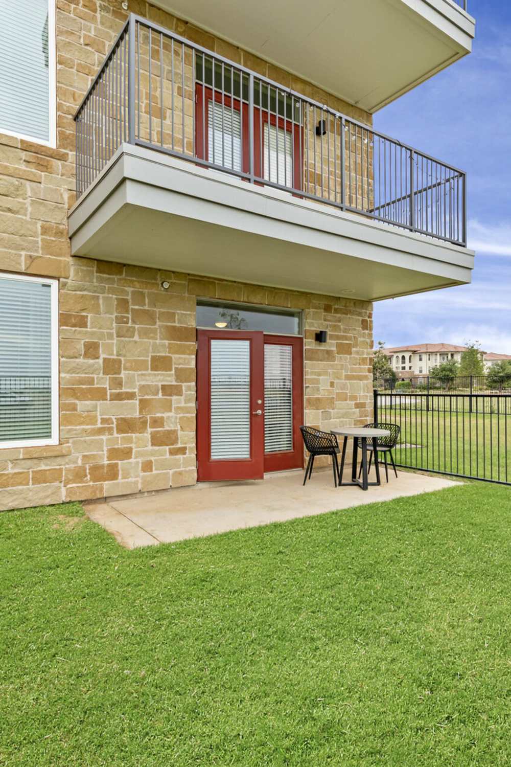 Lush green lawn at Slide North Apartments in Lubbock, Texas