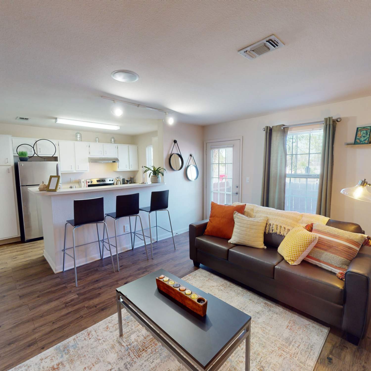 Open concept floor plan with hardwood floors at The Quarters at Lincoln in Lincoln, Nebraska
