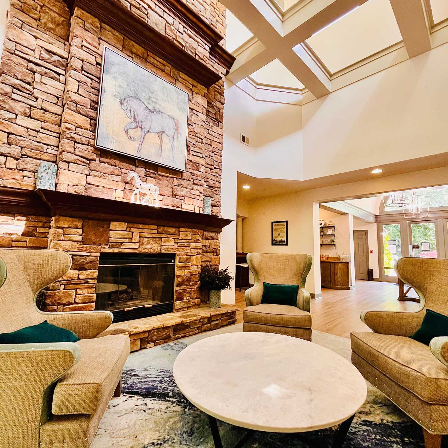 Fireside seating in the clubhouse at Retreat at Johns Creek in Duluth, Georgia