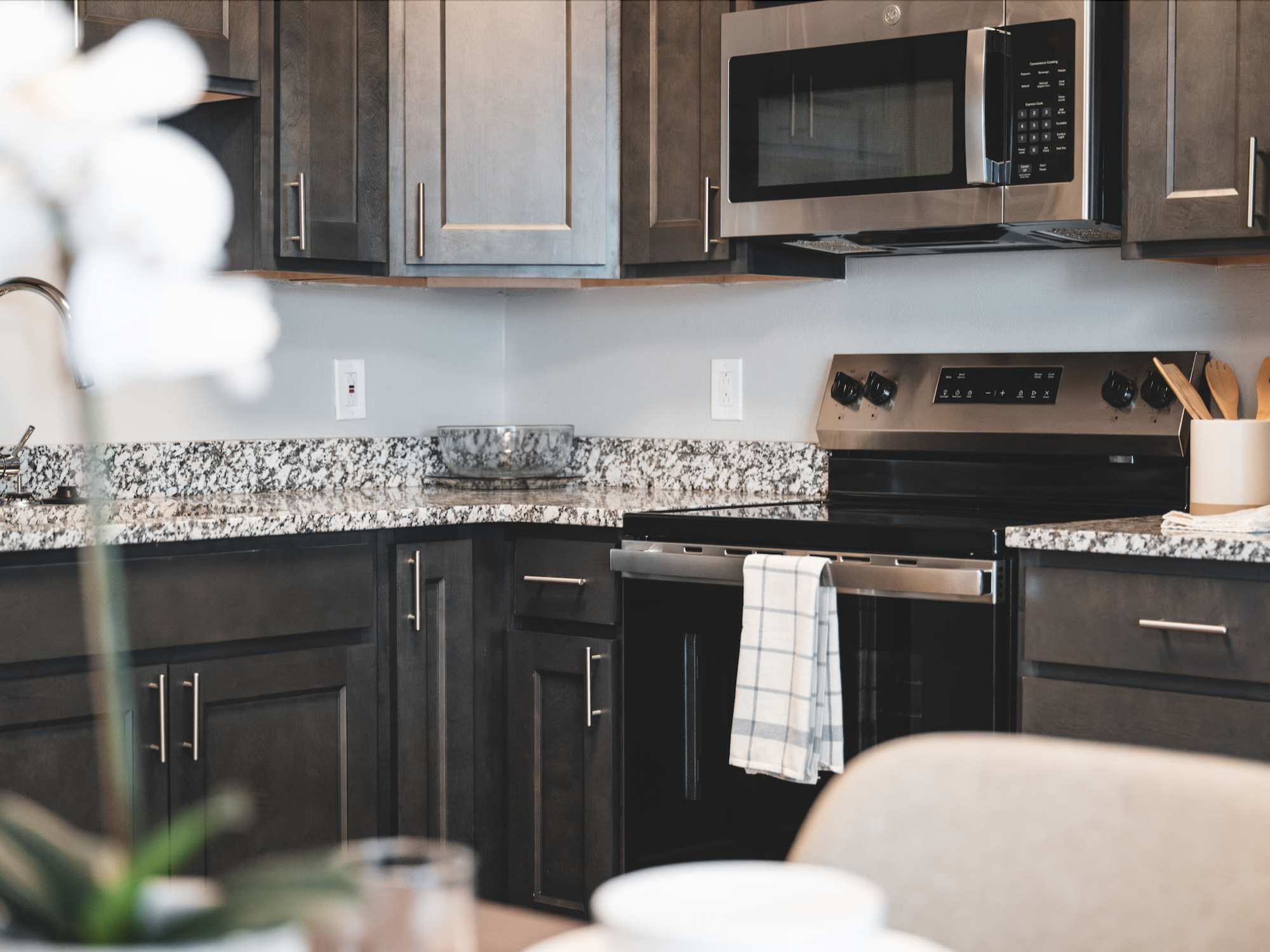 Kitchen with dark accents at Wynnwood at Freedom Road in Cranberry Township, Pennsylvania