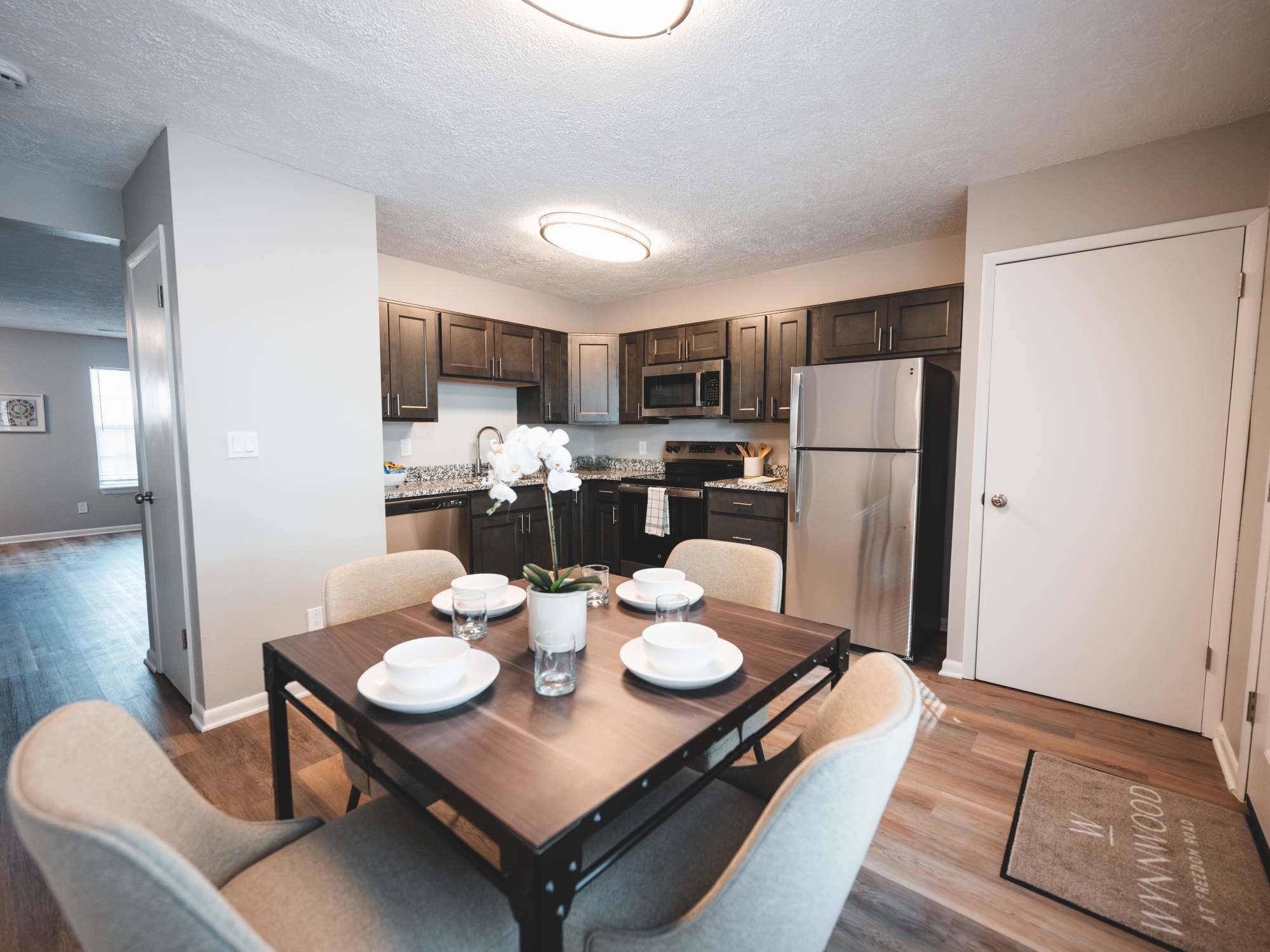 Dining room with dark accents at Wynnwood at Freedom Road in Cranberry Township, Pennsylvania