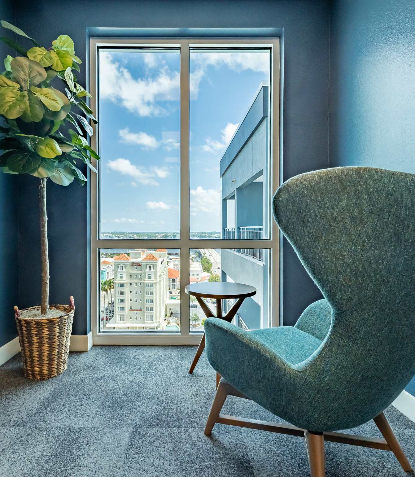 Cozy bedroom in a model home at Nine20 Manatee in Bradenton, Florida
