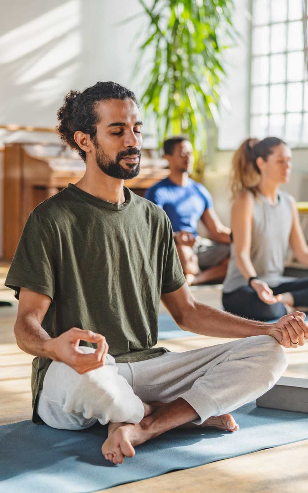 Residents doing yoga at Elms Watershed in Laurel, Maryland