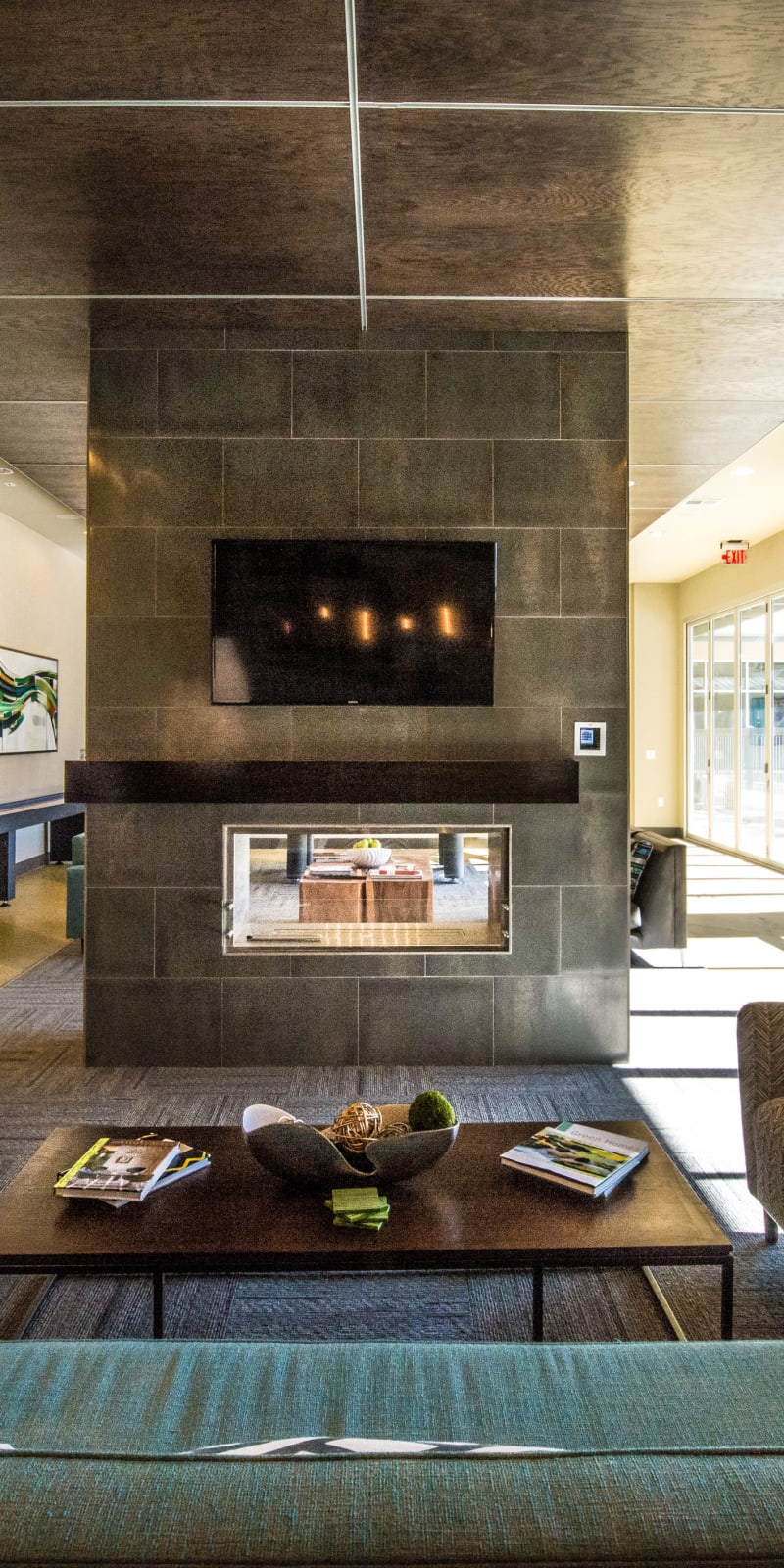 Elegant modern clubhouse with fireplace at 33 North in Denton, Texas
