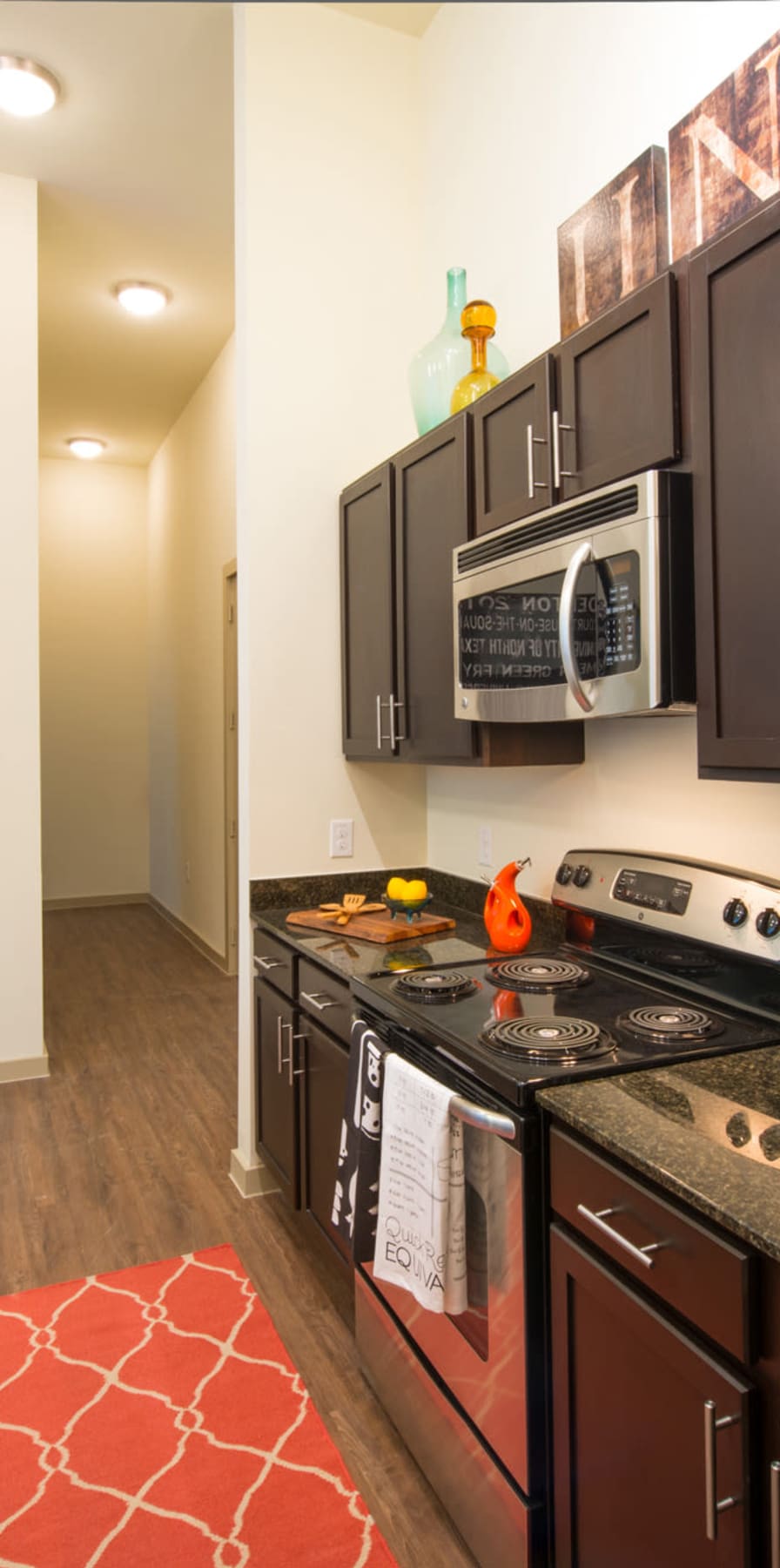 Modern kitchen in a model student apartment at 33 North in Denton, Texas