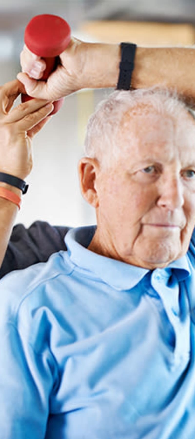 Resident performing therapy exercises with a trainer at Fair Oaks Health Care Center in Crystal Lake, Illinois