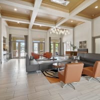 Modern furnishings in a model apartment's clubhouse at Grand Villas Apartments in Katy, Texas