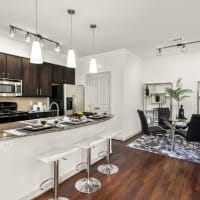 Kitchen with dining table at Discovery at Kingwood in Kingwood, Texas