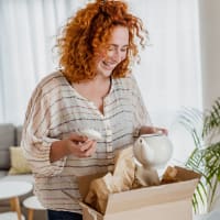 Woman enjoying some tea at Alma Hub 121 in McKinney, Texas