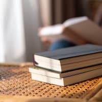 Notebooks on a table at Mode at Owings Mills in Owings Mills, Maryland