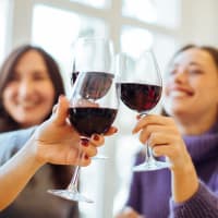 A group of women holding glasses of wine at The Station at Brighton in Grovetown, Georgia