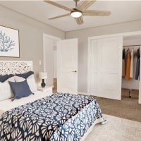 A render of a cozy bedroom with spacious closet at The Lyle in Fort Walton Beach, Florida