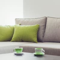 Comfy couch in a model home at The Cordelia in Fort Walton Beach, Florida