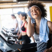 Resident getting a workout in at our fitness center at The Lyle in Fort Walton Beach, Florida