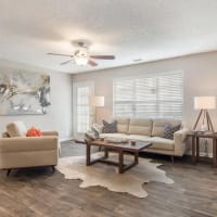 Wood flooring in a furnished apartment living room at Ten68 West in Dallas, Georgia