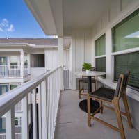 Seating on an apartment balcony at Sentosa Riverview in Riverview, Florida