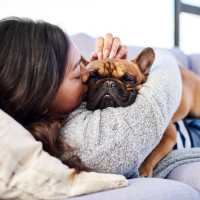 Resident with dog at Urbana Rental Flats in San Diego, California