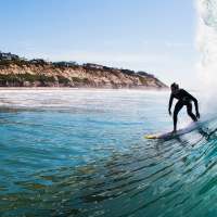 Man surfing at Urbana Rental Flats in San Diego, California