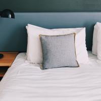 Bed with pillows at Torrey Ridge in Fresno, CA