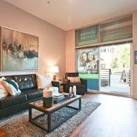 A furnished apartment living room at Environs Lofts at East 54 in Chapel Hill, North Carolina