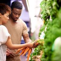 Resident couple shopping for produce at Sphere Apartments in Richmond, Virginia