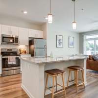 Kitchen with island at Lofts at Hamilton in Dalton, Georgia