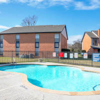 Swimming pool with community view at Plantation West in Hurst, Texas