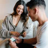 Couple Reviewing GRO cards