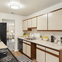 Kitchen of classic apartment floor plan at 83 West Townhomes in West Bloomfield Township, Michigan