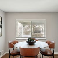 Dining room area of apartment at 83 West Townhomes in West Bloomfield Township, Michigan