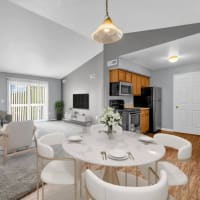 Spacious dining room and living room areas at River Club in Holland, Michigan