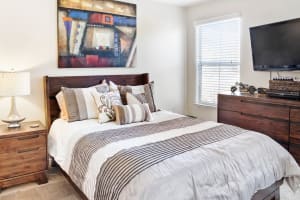 Bedroom at Woodpark Apartments in Aliso Viejo, California
