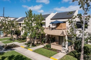 green lawns and apartments at Wallace Court Apartments in Costa Mesa, California