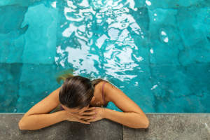 Resident in pool Solterra in San Diego, California