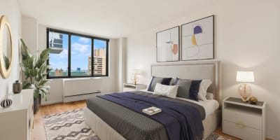 Spacious and bright bedroom with a spectacular view out the window at Carnegie Mews in New York, New York