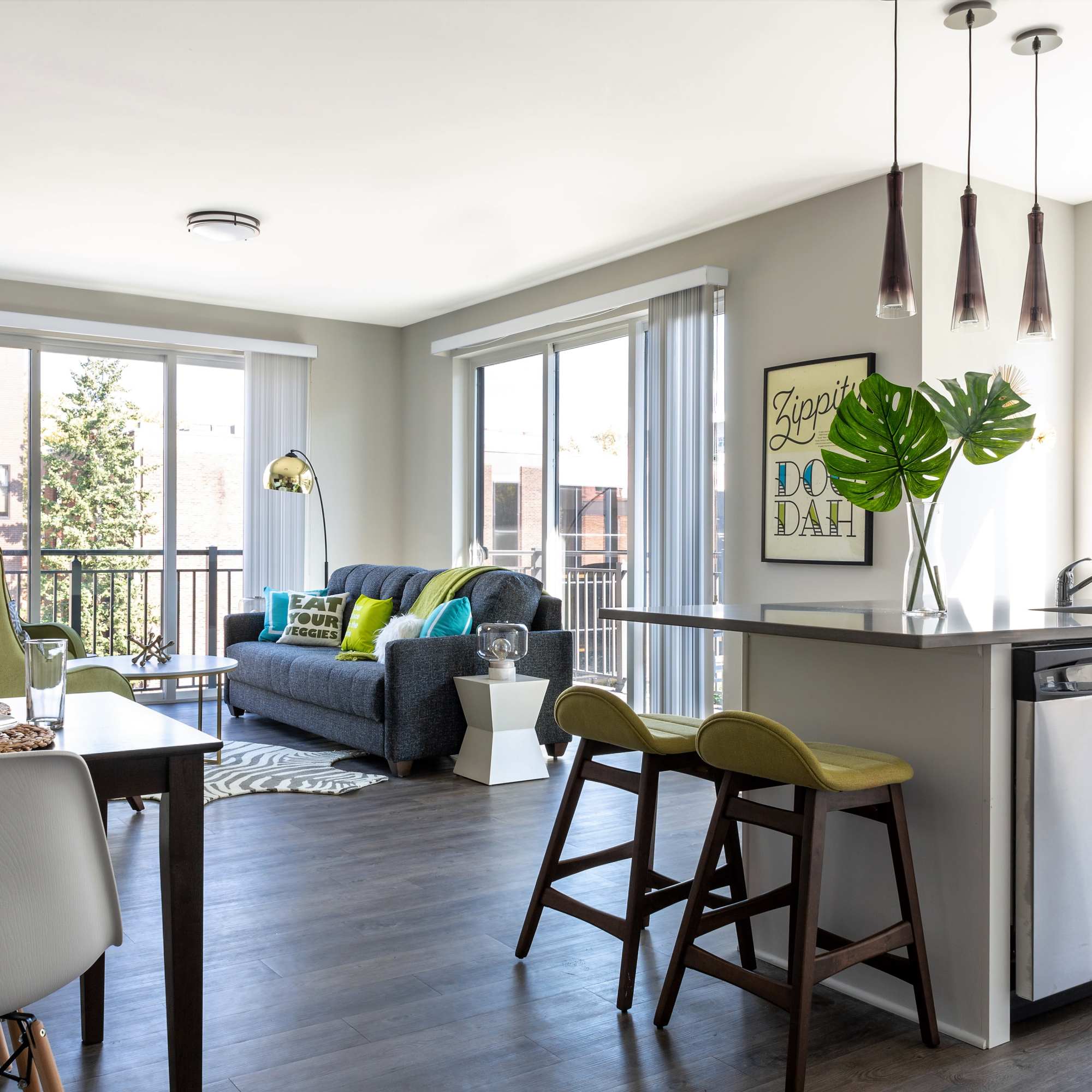 Gray sofa with colorful pillows at 223 E Town in Columbus, Ohio