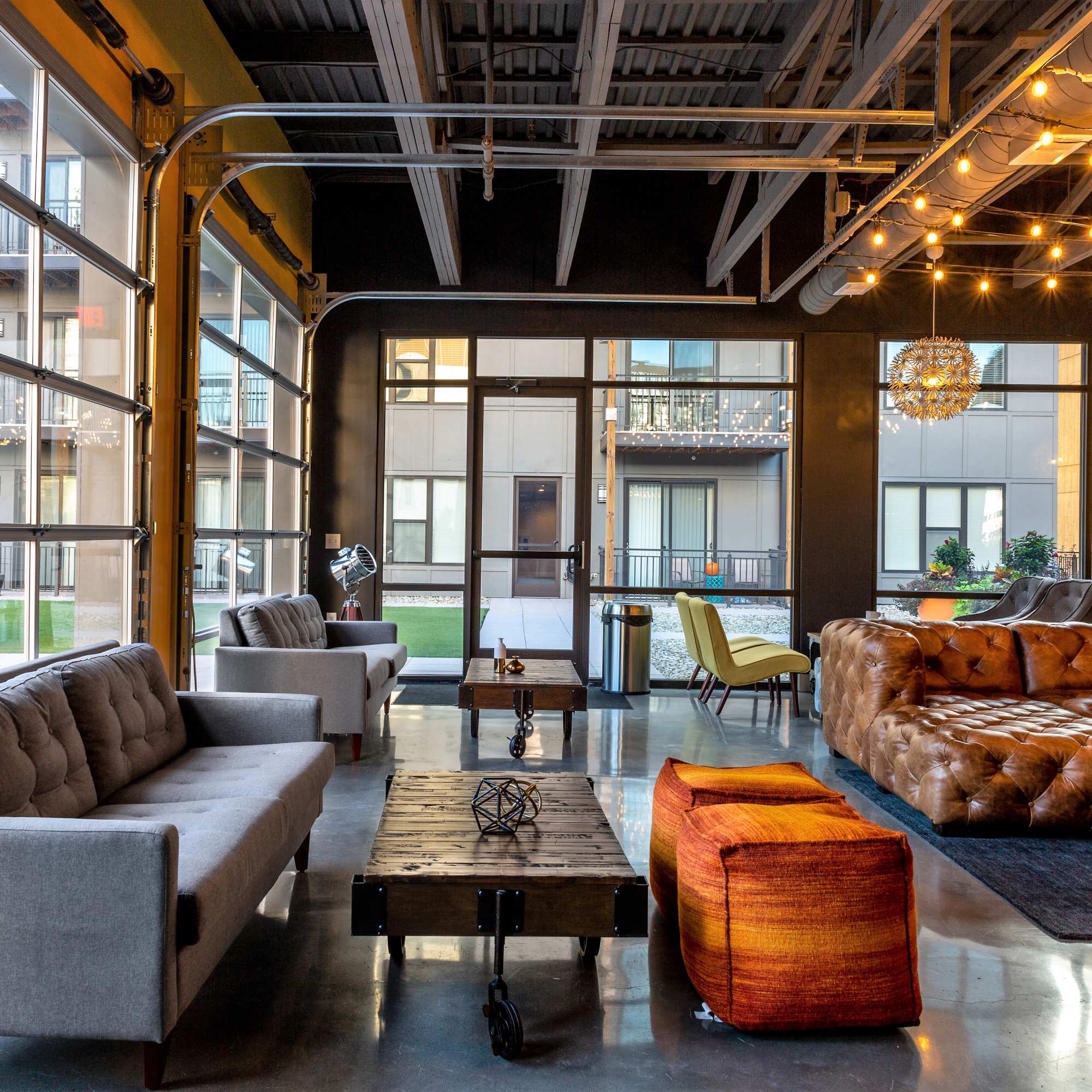 Gray sofas and wooden coffee tables at 223 E Town in Columbus, Ohio
