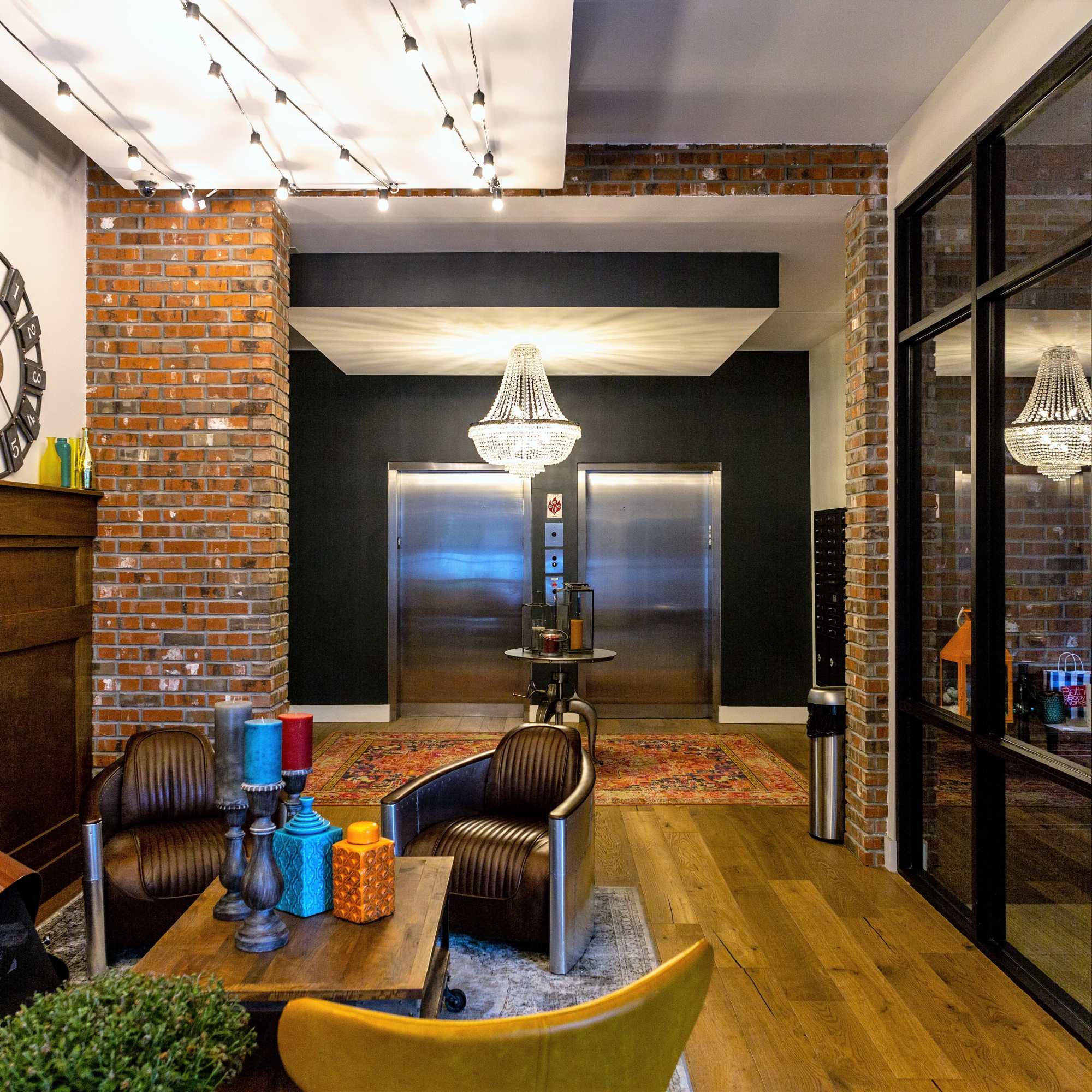Elevators with a chandelier above at 223 E Town in Columbus, Ohio