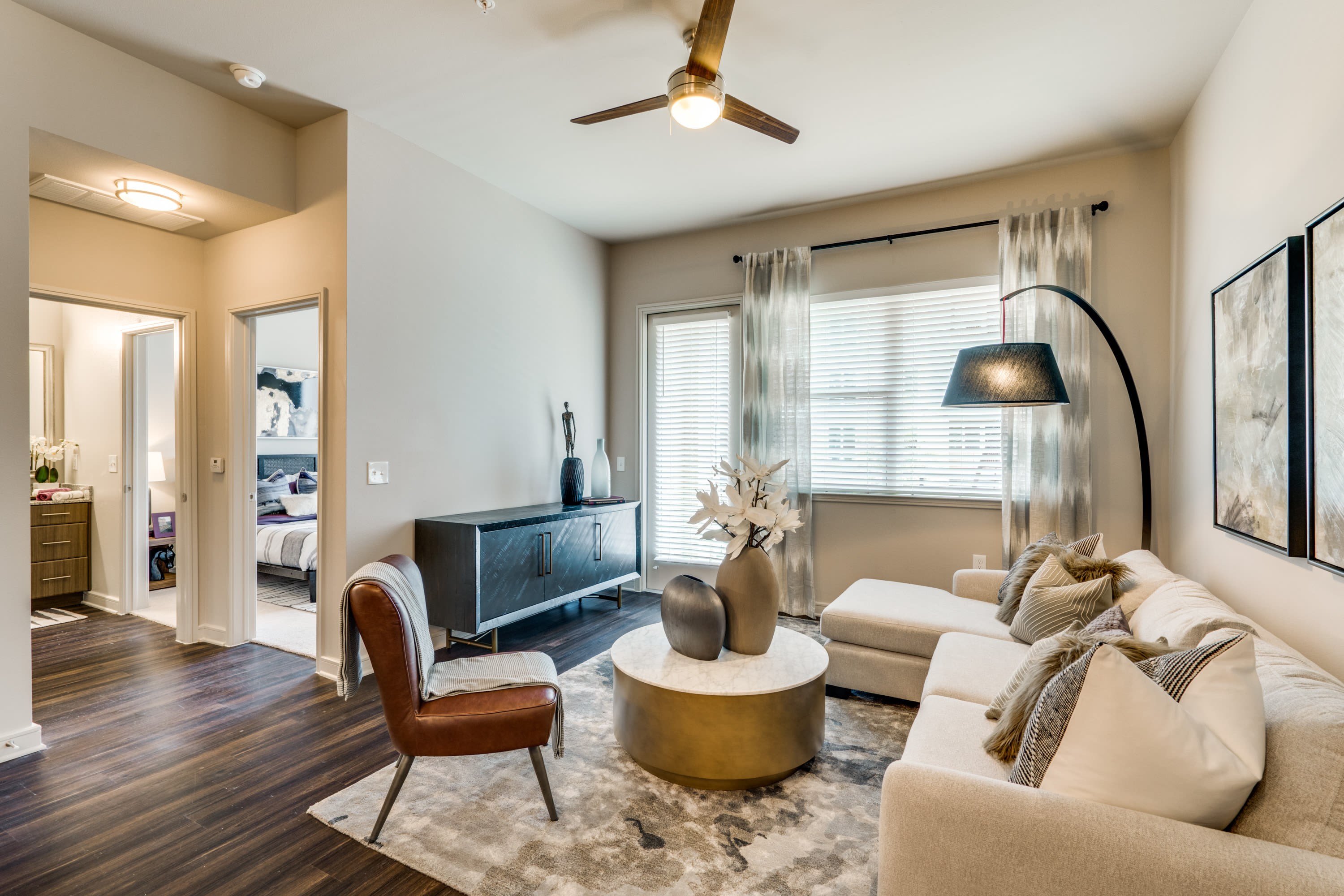 Furnished model living room at 801 LasCo in Irving, Texas