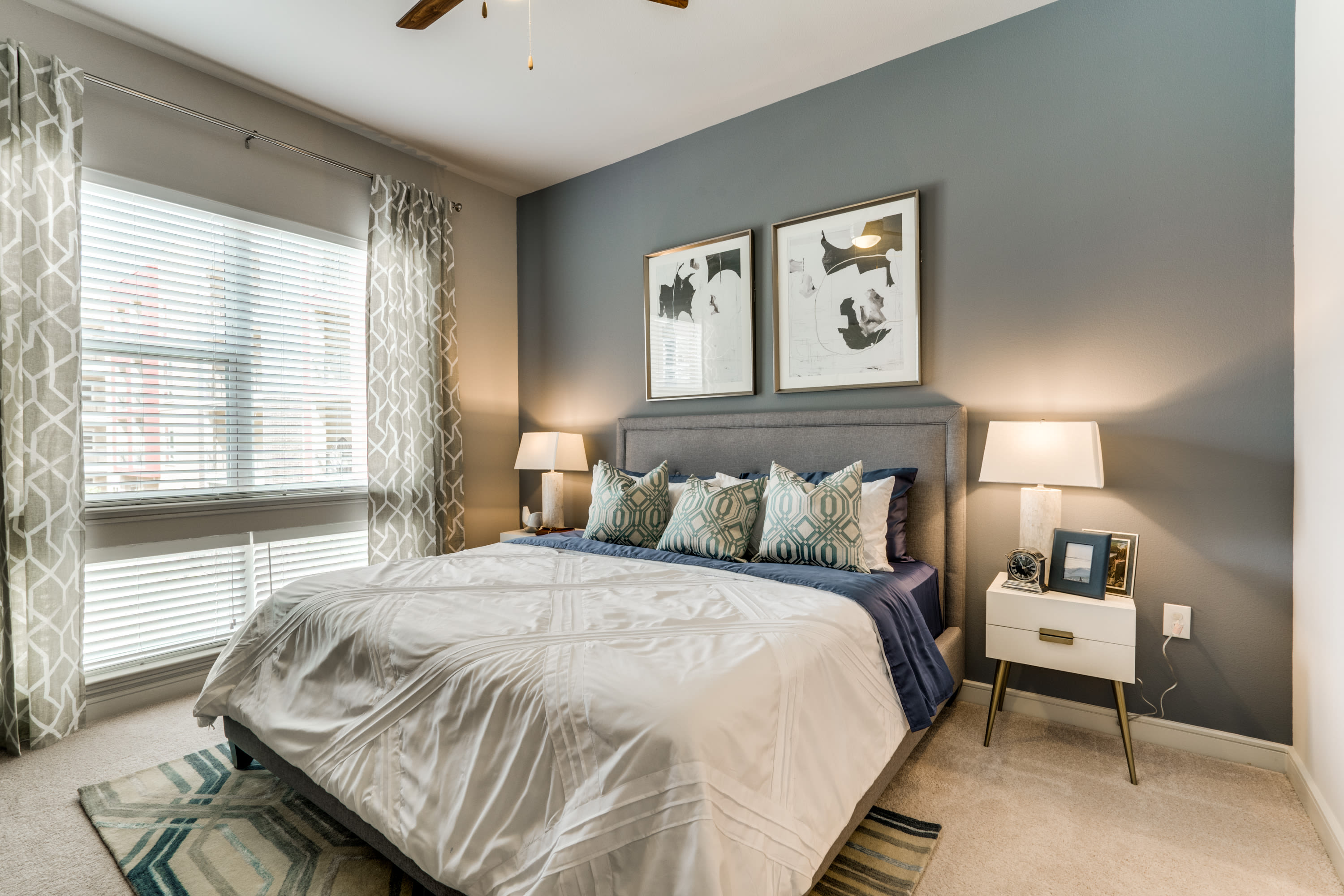 Furnished model bedroom at 801 LasCo in Irving, Texas