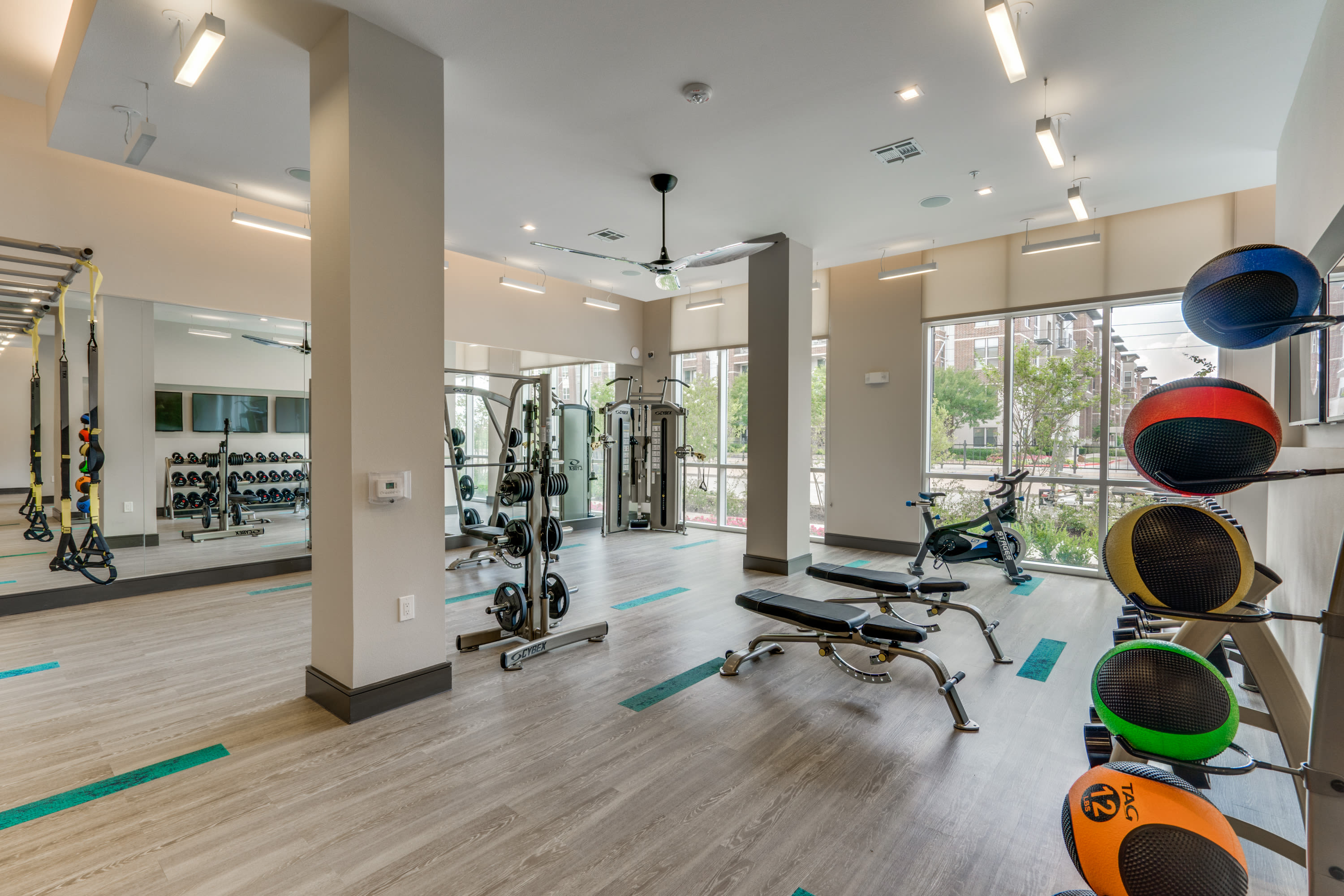 Equipped community fitness center at 801 LasCo in Irving, Texas