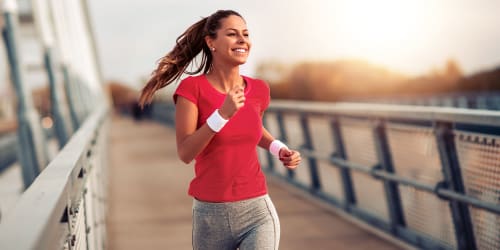 A women out for a jog near The Columbia at the Waterfront in Vancouver, Washington
