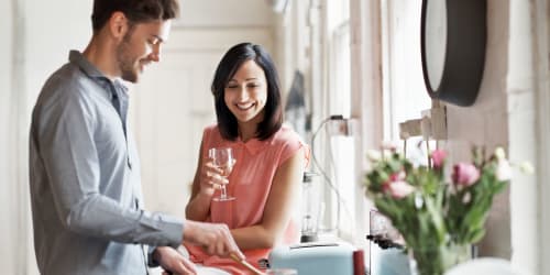 Happy couple cooking at Curtis Johnson in Los Angeles, California