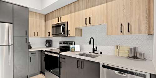 Spacious Kitchen and stainless steel appliances at  Radiate in Redmond, Washington