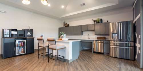 Apartment community pool and cabanas at Ashgrove Farms Townhomes in Nicholasville, Kentucky