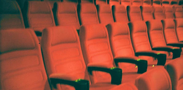 Residents watching movie in the theatre near The Met Rockville in Rockville, Maryland