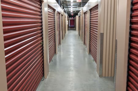 Interior view of large storage unit at StorQuest Self Storage